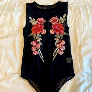 Mesh rose body suit from forever 21. Never worn.